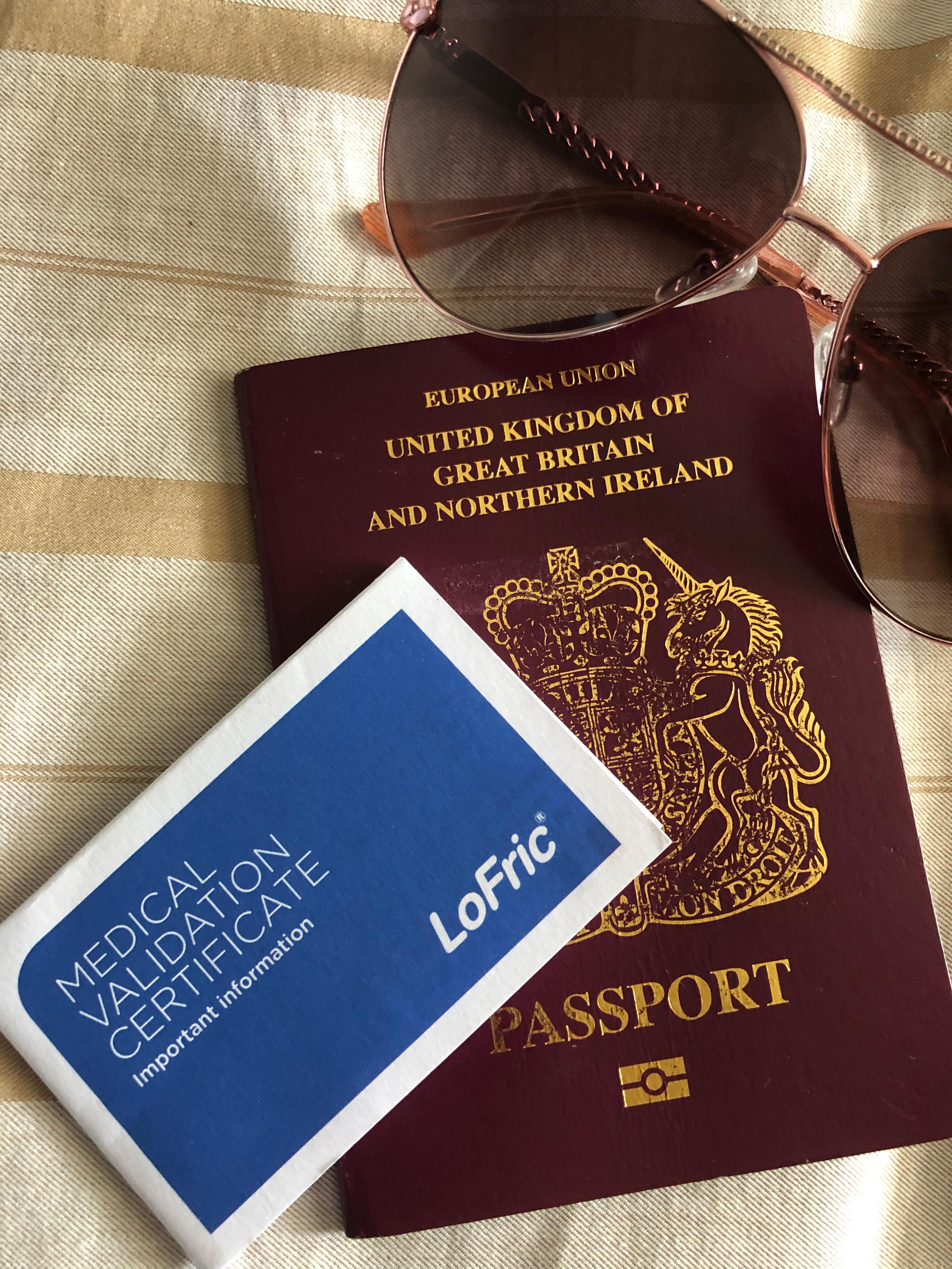 Blog 1 Photo 1 Travel essentials Passport sunglasses and your LoFric Medical Validation Certificate